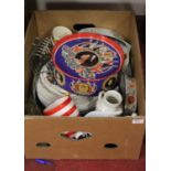 A box of sundry effects to include dinner wares, silver jubilee commemorative biscuit tin etc