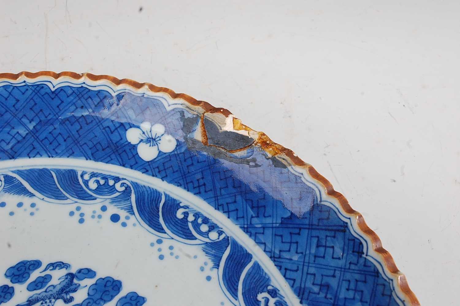 A large Chinese stoneware blue & white charger the centre glazed with a dragon amidst clouds - Image 3 of 9