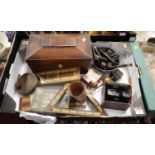 A box containing a collection of various items to include a George III mahogany tea caddy of