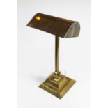 A 1930s American brass adjustable desk lamp, height 44cmCondition report: Adjusts and holds firm.