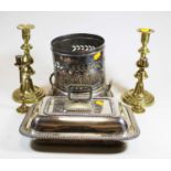 A small collection of metalware to include a silver plated entree dish and brass candlesticks (6)