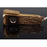 A modern 9ct gold mounted cigar cutter, having typical hinged action, the three applied gold