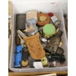 A collection of miscellaneous items to include pocket cigarette lighters, leather cased tape