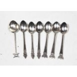 A set of six sterling silver teaspoons from Siam, the terminals each cast as deities, stamped