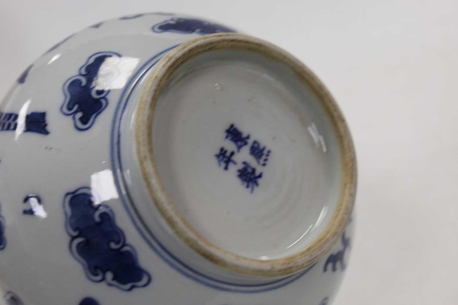 A Chinese export blue & white bottle vase of typical form decorated with mythical figures within - Image 7 of 11