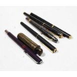 A Creeks & Creeks fountain pen, having metallic cap and barrel with gilt banding for Renault;