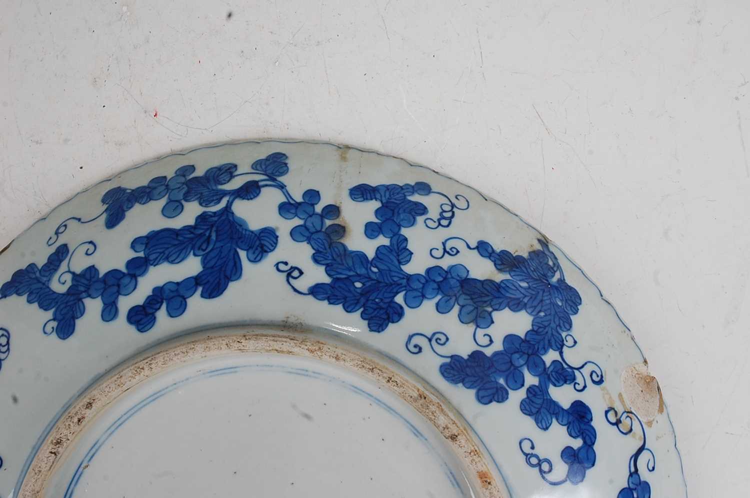 A large Chinese stoneware blue & white charger the centre glazed with a dragon amidst clouds - Image 7 of 9