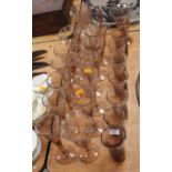 A 20th century pink tinted glass drinks set (20)
