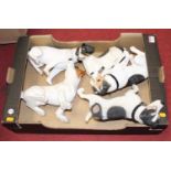 A collection of five Leonardo resin figures, each in the form of a Jack Russell
