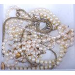 Costume jewellery, to include faux pearl necklaces, and a suede jewellery pouch