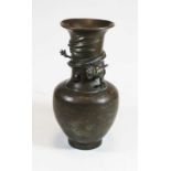 A Chinese export bronze vase, the flared rim above a tubular neck, relief decorated with a dragon,