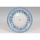 A Chinese export blue & white plate having typical underglazed blue floral decoration with blue seal