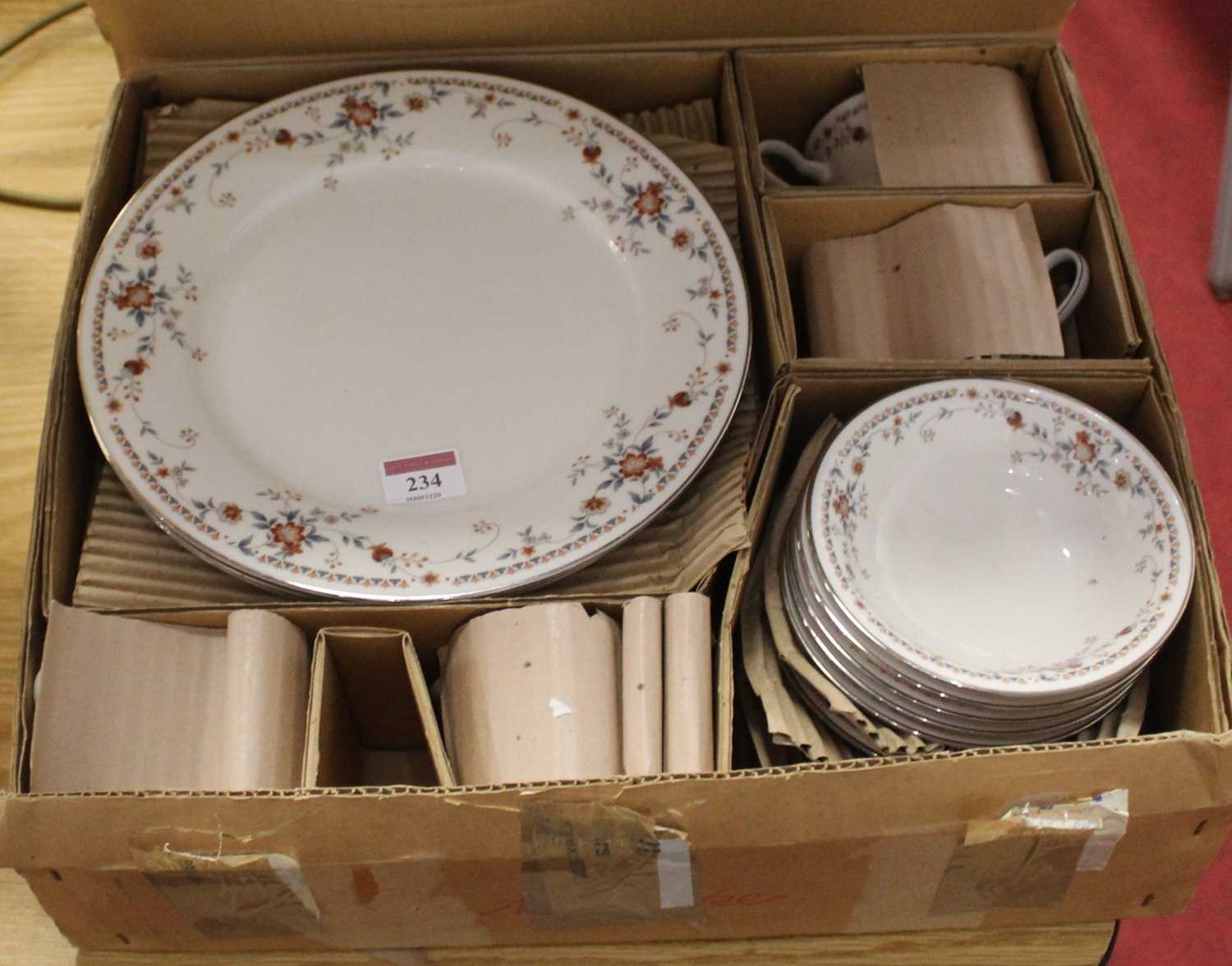 A modern Noritake ivory china eight-place setting dinner service, in the Adagio pattern, No.7237, in