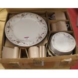 A modern Noritake ivory china eight-place setting dinner service, in the Adagio pattern, No.7237, in