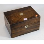 A Victorian rosewood and mother of pearl inlaid work box, the hinged lid opening to reveal a