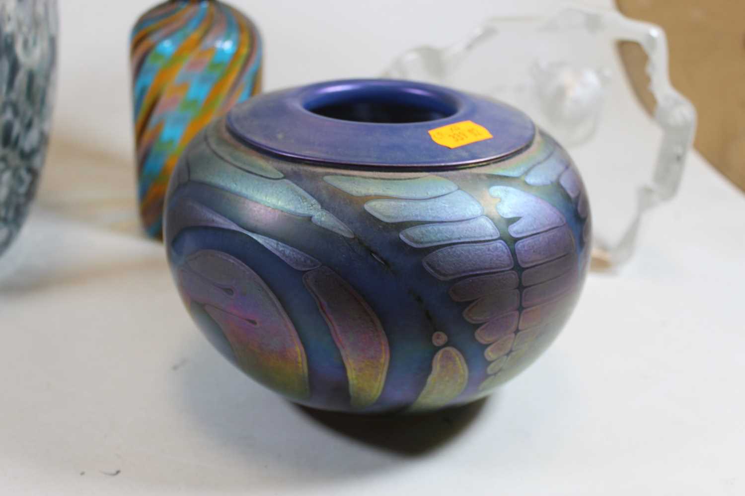 A Loetz style iridescent glass vase, of squat globular form, 13cm high, together with a Monart style - Image 2 of 6