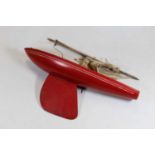 A mid-20th century red painted pond yacht, 46cm