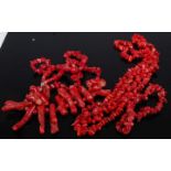 Two dyed coral necklaces; together with a matching bracelet, gross weight 153cm (3)