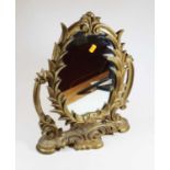 A 19th century style gilt swing framed toiletry mirror, H48cm