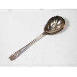 A George V silver serving spoon having shell bowl, 2.1oz, London 1912, 21cm