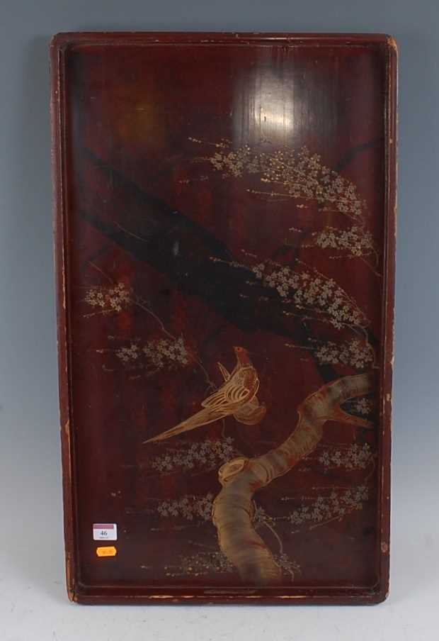 A Japanese Taisho period and red lacquered tray relief decorated with a pheasant amidst flowers