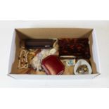 A collection of miscellaneous items, to include a red leather pocket watch case for J.W. Benson Ltd,