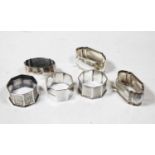 Six various silver napkin rings to include bright cut engraved octagonal example, Victorian and