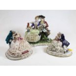 A Continental porcelain figure group of a courting couple with a parrot, 20cm high, together with