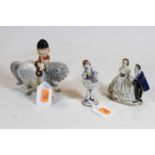 A Beswick Thelwell girl on pony, boxed; together with two Continental figures (3)`