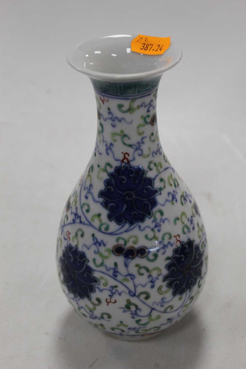 A Chinese export blue & white bottle vase of typical form decorated with mythical figures within - Image 10 of 11