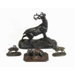 After Pierre Jules Mêne (1810-1879) - a bronzed model of a recumbent doe, on naturalistic base,