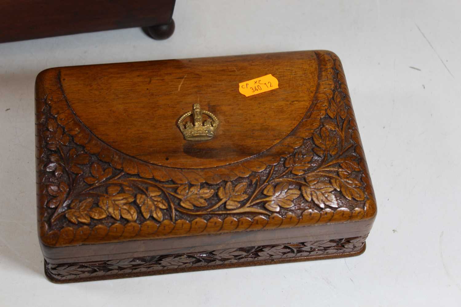 A Regency mahogany tea caddy, of sarcophagus form with kite shaped escutcheons standing on four ball - Image 2 of 4