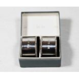 A pair of Irish silver napkin rings, by William Egain of Cork, each having ropetwist borders, 3oz,