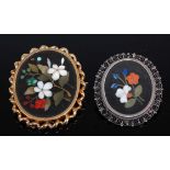 Two pietra dura brooches, the first oval brooch inset with floral decoration collet mounted with