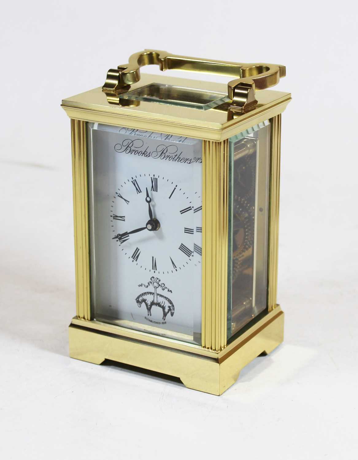 A 20th century Brooks Brothers lacquered brass cased carriage clock, the dial showing Roman