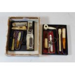 A small collection of assorted smoking implements, to include an early 20th century mother of