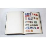 A Schoolboy stamp collection contained in an Adelphi Stamp Album, contents range from Austria to