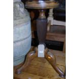 A 19th century mahogany circular fixed-top pedestal kettle stand, h.65.5cm