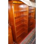 Two near matching contemporary mahogany freestanding open bookshelves, the larger width 183cm