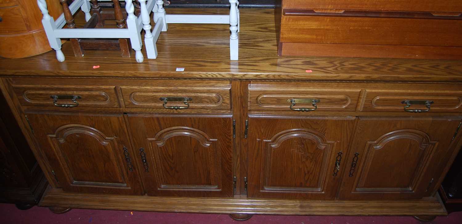 A large contemporary Belgian oak sideboard, width 238cm