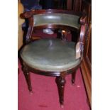 A Louis XVI style mahogany and green leather studded upholstered tub salon chair