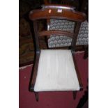 A pair of Regency mahogany scroll bar back dining chairs, together with a set of four 19th century