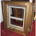 A gilt composition picture frame, circa 1900, and two others (3)