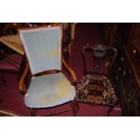 A Victorian mahogany nursing chair, together with another Victorian beech open armchair (2)