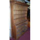 A large pine freestanding open pantry shelf, of shaped form, width 147cmCondition report: Height