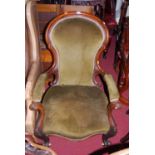 A mid-Victorian mahogany show frame scroll armchair, width 70cm