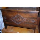 An early 20th century floral relief carved joined oak hinge top blanket box, width 89cm