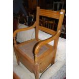 An Edwardian satin walnut commode chair, width 54cm