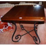 A contemporary joined cherrywood and wrought iron low square occasional table, width 61cm