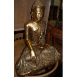 A large contemporary gilt decorated and colour glass inset seated Buddha, h.87cm